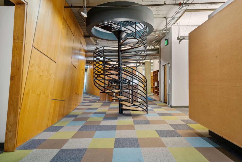 Hall way with spiral stair case