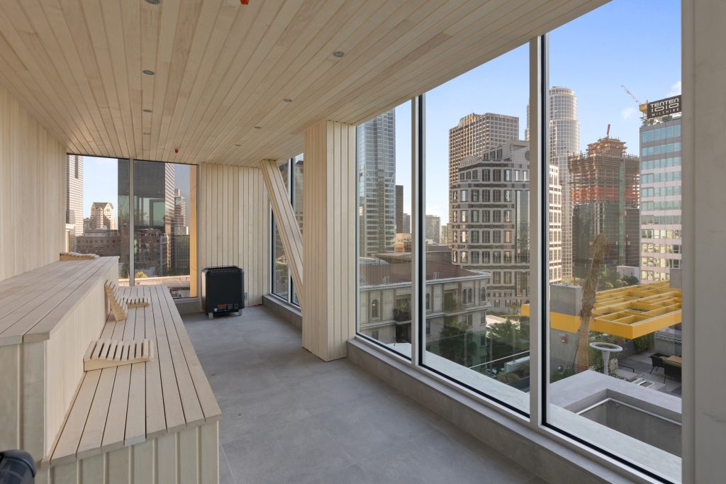 bright wooden room with large windows