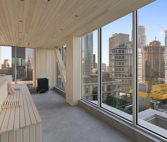 bright wooden room with large windows